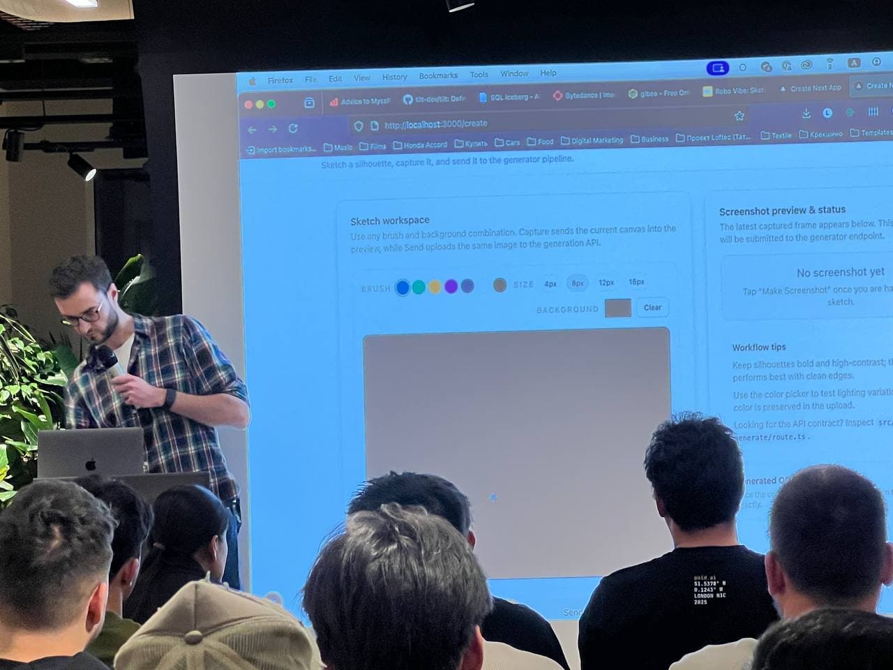 Eli Lutay presenting at a tech event